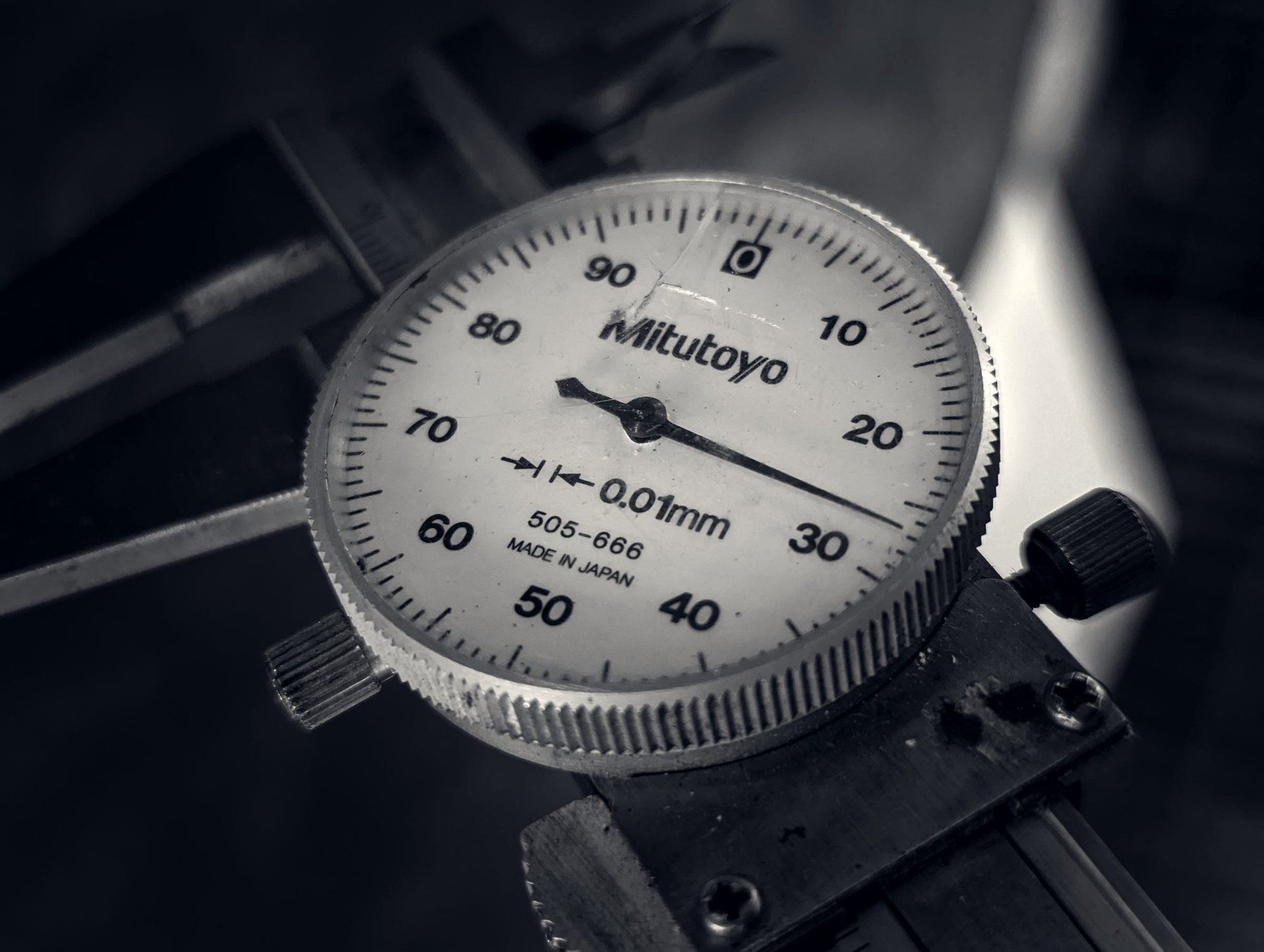 Dial indicator reading to 0.01 millimetre